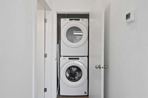 217-205 Spring Creek Common Sw, Calgary, AB - Indoor Photo Showing Laundry Room