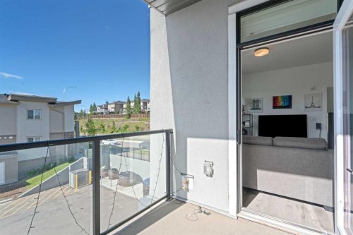 217-205 Spring Creek Common Sw, Calgary, AB - Outdoor With Balcony With Exterior