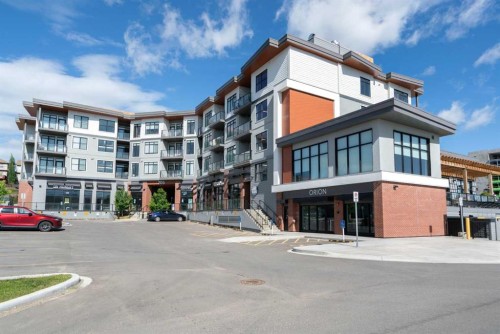 217-205 Spring Creek Common Sw, Calgary, AB - Outdoor With Balcony With Facade