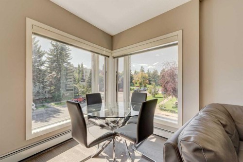 205-93 34 Avenue Sw, Calgary, AB - Indoor Photo Showing Dining Room