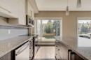 205-93 34 Avenue Sw, Calgary, AB  - Indoor Photo Showing Kitchen With Upgraded Kitchen 