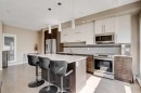 205-93 34 Avenue Sw, Calgary, AB  - Indoor Photo Showing Kitchen With Stainless Steel Kitchen With Upgraded Kitchen 