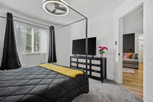 210-10 Sierra Morena Mews Sw, Calgary, AB - Indoor Photo Showing Bedroom