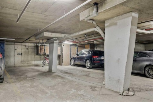 210-10 Sierra Morena Mews Sw, Calgary, AB - Indoor Photo Showing Garage