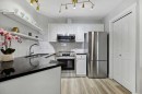 210-10 Sierra Morena Mews Sw, Calgary, AB  - Indoor Photo Showing Kitchen With Stainless Steel Kitchen 