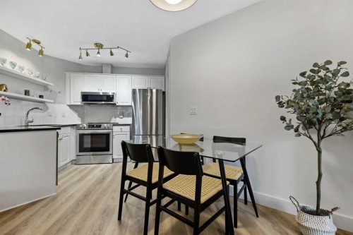 210-10 Sierra Morena Mews Sw, Calgary, AB - Indoor Photo Showing Kitchen With Stainless Steel Kitchen