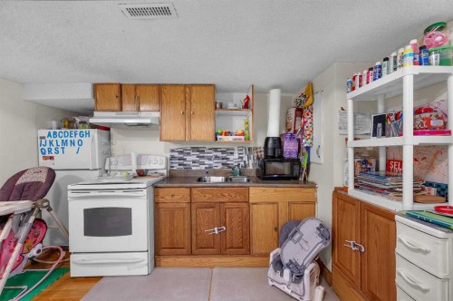 143 Taralake Way Ne, Calgary, AB - Indoor Photo Showing Kitchen With Double Sink