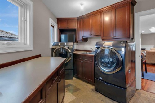58 Scimitar View Nw, Calgary, AB - Indoor Photo Showing Laundry Room