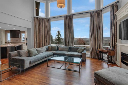 58 Scimitar View Nw, Calgary, AB - Indoor Photo Showing Living Room With Fireplace