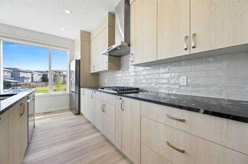232 Belmont Park Sw, Calgary, AB - Indoor Photo Showing Kitchen With Upgraded Kitchen