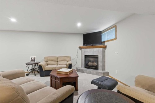 131 Cambria Road, Strathmore, AB - Indoor With Fireplace