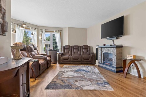 131 Cambria Road, Strathmore, AB - Indoor Photo Showing Living Room With Fireplace