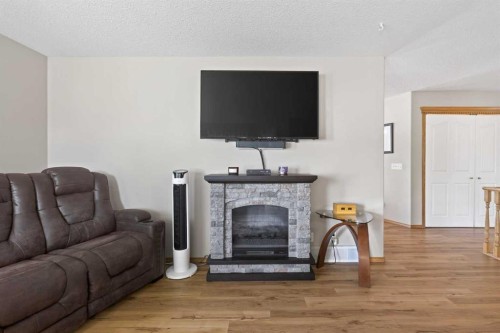 131 Cambria Road, Strathmore, AB - Indoor Photo Showing Living Room With Fireplace