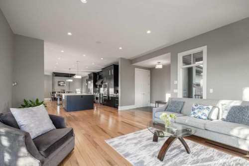 16 Spring Valley Way Sw, Calgary, AB - Indoor Photo Showing Living Room