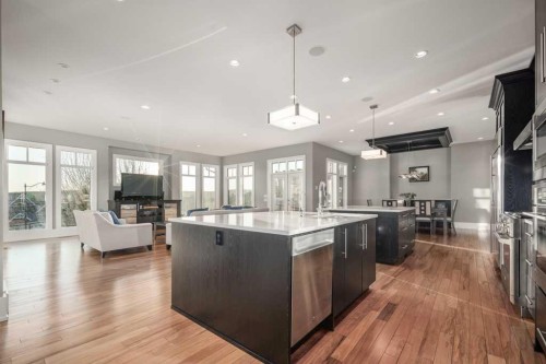 16 Spring Valley Way Sw, Calgary, AB - Indoor Photo Showing Kitchen With Upgraded Kitchen