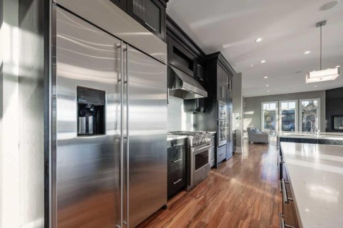 16 Spring Valley Way Sw, Calgary, AB - Indoor Photo Showing Kitchen With Upgraded Kitchen