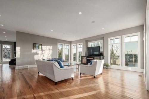 16 Spring Valley Way Sw, Calgary, AB - Indoor Photo Showing Living Room