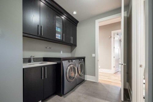 16 Spring Valley Way Sw, Calgary, AB - Indoor Photo Showing Laundry Room