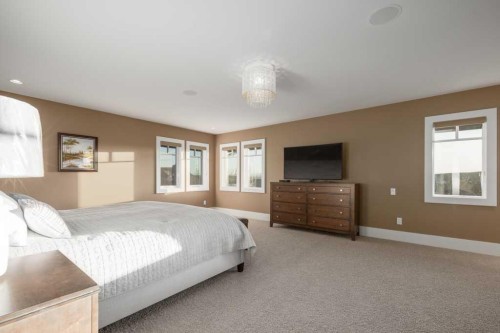 16 Spring Valley Way Sw, Calgary, AB - Indoor Photo Showing Bedroom