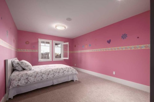 16 Spring Valley Way Sw, Calgary, AB - Indoor Photo Showing Bedroom