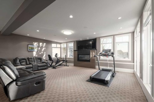 16 Spring Valley Way Sw, Calgary, AB - Indoor With Fireplace