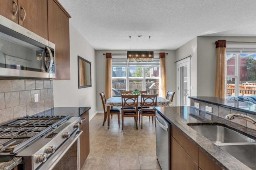 57 Silverado Skies Drive Sw, Calgary, AB - Indoor Photo Showing Kitchen With Upgraded Kitchen
