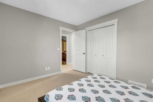 57 Silverado Skies Drive Sw, Calgary, AB - Indoor Photo Showing Bedroom