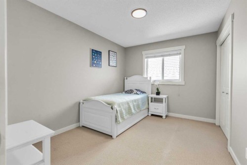 57 Silverado Skies Drive Sw, Calgary, AB - Indoor Photo Showing Bedroom