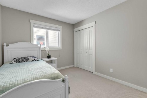57 Silverado Skies Drive Sw, Calgary, AB - Indoor Photo Showing Bedroom