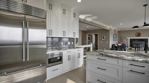 57 Edelweiss Point Nw, Calgary, AB - Indoor Photo Showing Kitchen With Upgraded Kitchen