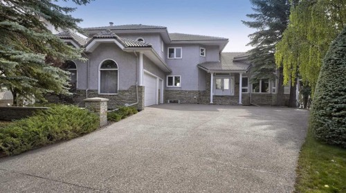 57 Edelweiss Point Nw, Calgary, AB - Outdoor With Facade