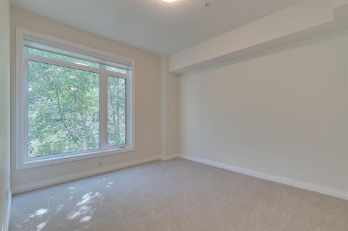304-10 Hemlock Crescent Sw, Calgary, AB - Indoor Photo Showing Other Room
