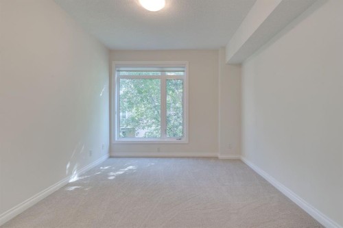 304-10 Hemlock Crescent Sw, Calgary, AB - Indoor Photo Showing Other Room