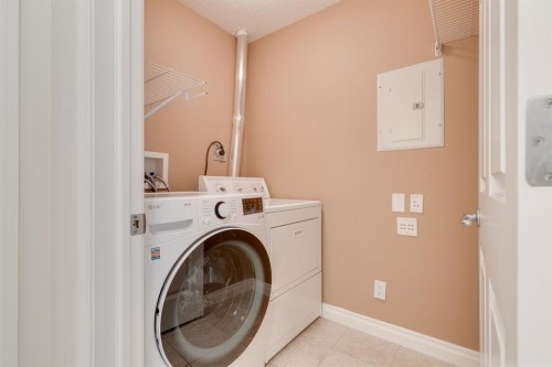 304-10 Hemlock Crescent Sw, Calgary, AB - Indoor Photo Showing Laundry Room