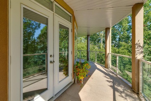 304-10 Hemlock Crescent Sw, Calgary, AB - Outdoor With Deck Patio Veranda With Exterior