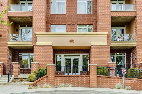 304-10 Hemlock Crescent Sw, Calgary, AB - Outdoor With Balcony With Facade