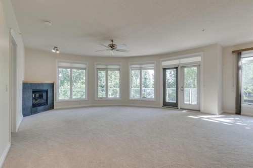 304-10 Hemlock Crescent Sw, Calgary, AB - Indoor With Fireplace