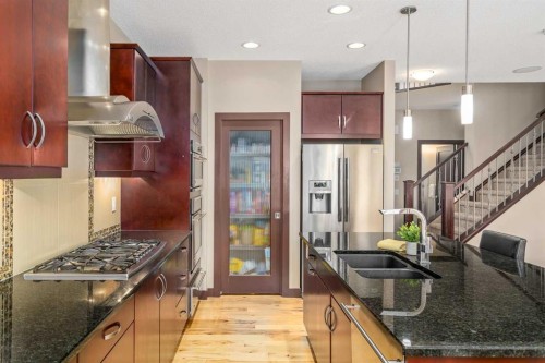 26 Mahogany Green Se, Calgary, AB - Indoor Photo Showing Kitchen With Double Sink With Upgraded Kitchen