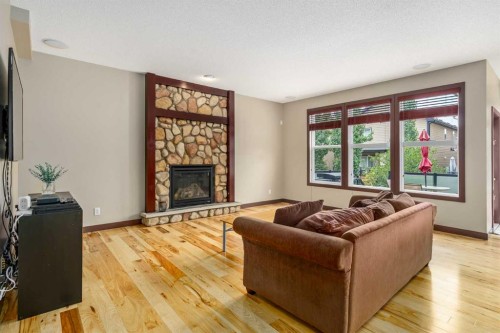26 Mahogany Green Se, Calgary, AB - Indoor Photo Showing Living Room With Fireplace