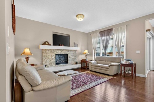 2075 Brightoncrest Common Se, Calgary, AB - Indoor Photo Showing Living Room With Fireplace