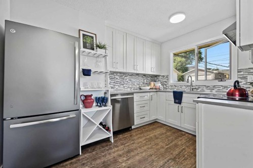 708 101 Avenue Sw, Calgary, AB - Indoor Photo Showing Kitchen With Stainless Steel Kitchen With Upgraded Kitchen