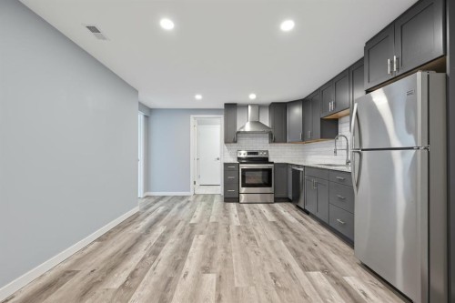 708 101 Avenue Sw, Calgary, AB - Indoor Photo Showing Kitchen With Stainless Steel Kitchen