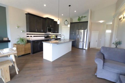 702 Fairways Drive, Vulcan, AB - Indoor Photo Showing Kitchen With Upgraded Kitchen