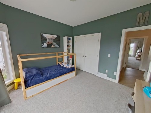 702 Fairways Drive, Vulcan, AB - Indoor Photo Showing Bedroom