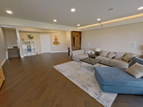 702 Fairways Drive, Vulcan, AB - Indoor Photo Showing Living Room