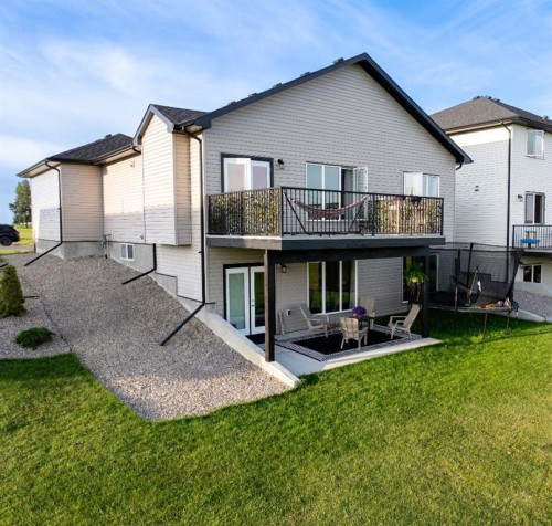 702 Fairways Drive, Vulcan, AB - Outdoor With Deck Patio Veranda With Exterior