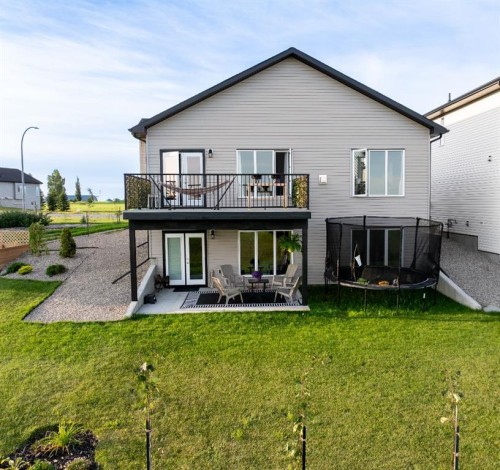 702 Fairways Drive, Vulcan, AB - Outdoor With Deck Patio Veranda With Exterior