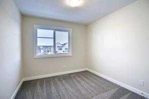 63 Lambeau Lane Se, Airdrie, AB - Indoor Photo Showing Other Room