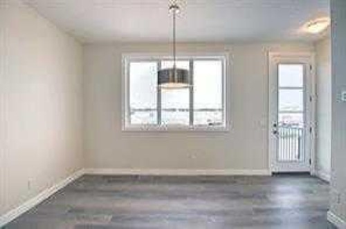 63 Lambeau Lane Se, Airdrie, AB - Indoor Photo Showing Other Room