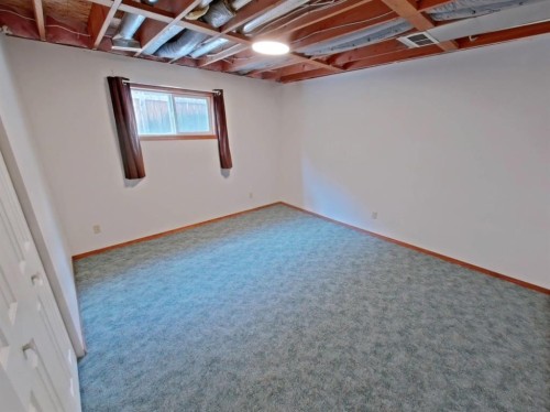 409 1 Street North, Vulcan, AB - Indoor Photo Showing Basement